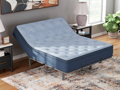 12-inch medium hybrid mattress, Queen on an adjustable base in a bedroom; base and accessories not included - 6