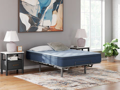 12-inch medium hybrid mattress, Queen on an adjustable base in a room; base and accessories not included - 8