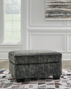 35-Inch Gunmetal Upholstered Ottoman with Faux Wood-Finish Feet, room setting; rug excluded - 4