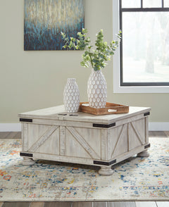 36-Inch Whitewash Storage Coffee Table with Dual Hinged Lids, closed room setting; accessories excluded - 3