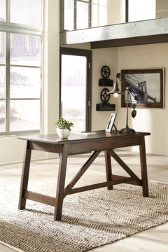 60-Inch Rustic Brown Writing Desk with Two Drawers, room setting; additional furniture and accessories not included - 2