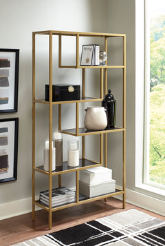 70-Inch Goldtone Metal and Gray Glass Five-Shelf Bookcase, room setting; additional furniture and accessories not included - 2