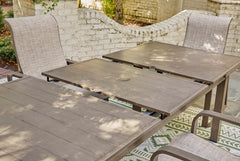 71–94-Inch Wood-Look Aluminum Outdoor Extension Dining Table, extension mechanism step one; chairs not included - 7
