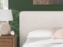 Beige California King upholstered bed, upholstered headboard detail - 17