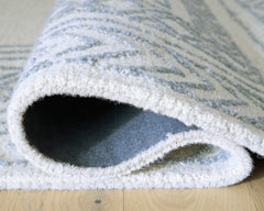 Blue Ivory and Gray Hand-Tufted Wool Border Area Rug, rolled edge and backing detail - 4