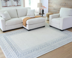 Blue Ivory and Gray Hand-Tufted Wool Border Area Rug, larger size in a styled room; other items not included - 6