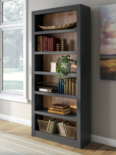 Brown and black bookcase styled with books and decor; accessories not included - 2