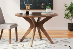 45-inch round brown dining table, styled table with chairs and accessories sold separately - 5