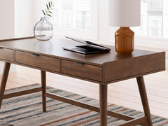 Brown mid-century desk with three drawers — drawer and desktop detail - 4