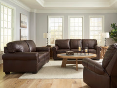 Dark Brown Leather and Faux Leather Seating, sofa loveseat and rocker recliner; tables and decor excluded - 18