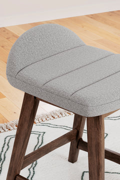 light gray and brown upholstered counter stools, upholstery and seat detail - 5
