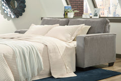 Light Gray queen sleeper sofa, bed open in room; linens and room accessories not included - 47