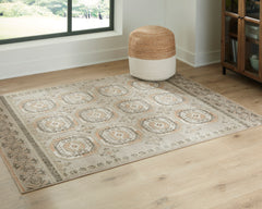 Muted Neutral Medallion Area Rug with Classic Border, smaller size in a styled room; other items not included - 2