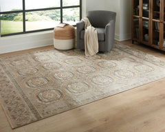 Muted Neutral Medallion Area Rug with Classic Border, larger size in a styled room; other items not included - 6