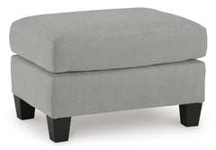 Shadow gray living room seating, ottoman angled view - 18