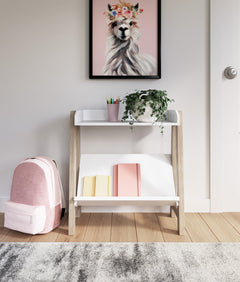 Small White and Tan Bookcase with Angled Shelf, room setting; additional furniture and accessories not included - 2