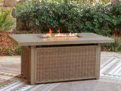 Beige, fire pit table in outdoor setting - 2