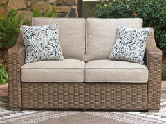 Beige, loveseat in outdoor setting; accessories excluded - 2