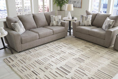 Ivory/Brown/Black 91.75" x 121", room view; furniture excluded - 2