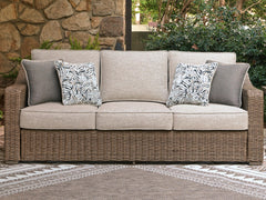 Beige, sofa in outdoor setting; accessories excluded - 2