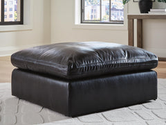 Black, complete ottoman in room; accessories excluded - 2