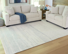 Ivory/Blue 92.5" x 118.5", room view; furniture excluded - 2