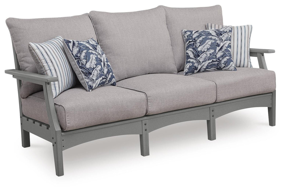 Gray, full sofa with cushions and four pillows