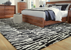 Black/Ivory 123" x 170", room view; furniture excluded - 2