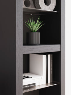 Black, open shelves and woodgrain finish detail - 4