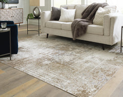 Tan/Brown/Gray 94.25" x 122.5", room view; furniture excluded - 2