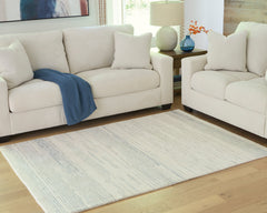 Ivory/Blue 60.75" x 83.13", room view; furniture excluded - 6