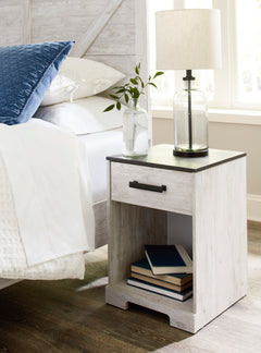Whitewash/Charcoal Gray / 19.61 in wide, nightstand in room setting; accessories excluded - 10