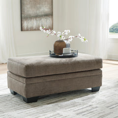 Nutmeg, ottoman in room - 2