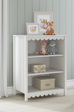 White, bookcase in room setting; accessories excluded - 5
