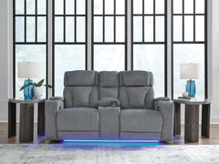 Steel, loveseat in room setting with blue lighting - 2