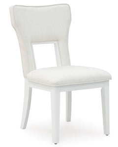 White Dining Chairs, angle view; sold as a matching pair; tables, additional chairs and accessories excluded - 1